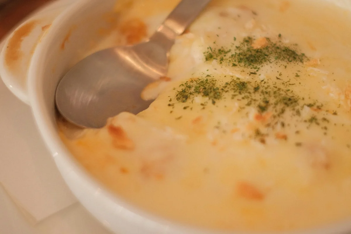 A bowl of French-Canadian split pea soup with a spoon
